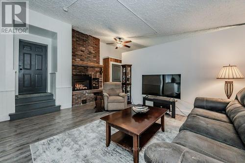 1303 Maryhill Road E, Woolwich, ON - Indoor Photo Showing Living Room With Fireplace