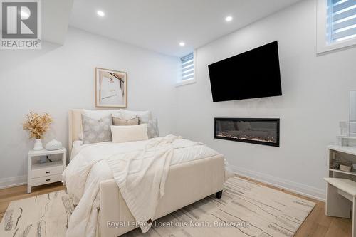 103 Springside Crescent, Blue Mountains (Blue Mountain Resort Area), ON - Indoor Photo Showing Bedroom With Fireplace