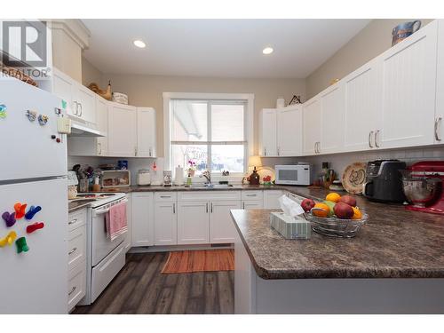 8804 17 Street, Dawson Creek, BC - Indoor Photo Showing Kitchen With Double Sink