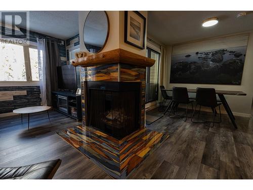 2035 Panorama Drive Unit# 202, Panorama, BC - Indoor Photo Showing Living Room With Fireplace