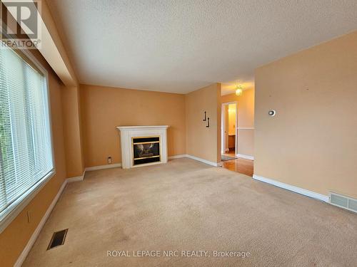 107 Commercial Street, Welland (773 - Lincoln/Crowland), ON - Indoor Photo Showing Other Room With Fireplace