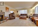 8272 St John Crescent, Prince George, BC  - Indoor Photo Showing Living Room With Fireplace 