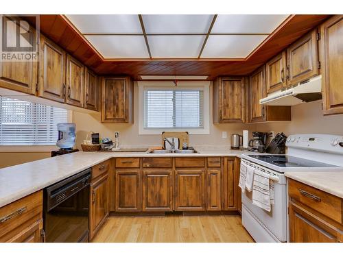 8272 St John Crescent, Prince George, BC - Indoor Photo Showing Kitchen With Double Sink