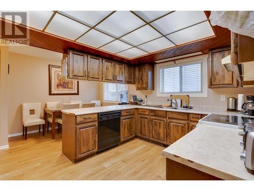 8272 St John Crescent, Prince George, BC - Indoor Photo Showing Kitchen With Double Sink