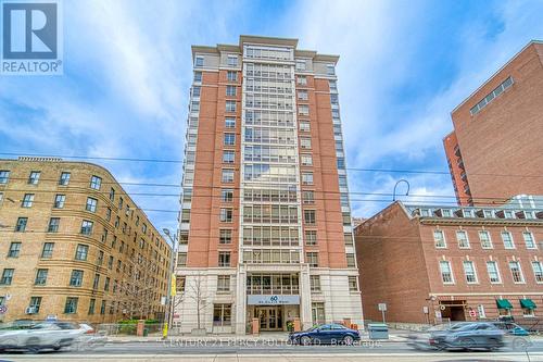 906 - 60 St Clair Avenue W, Toronto, ON - Outdoor With Facade