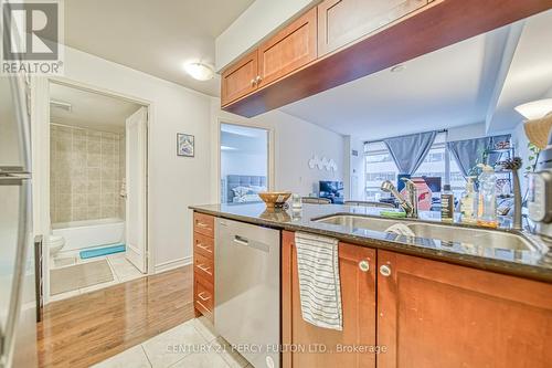 906 - 60 St Clair Avenue W, Toronto, ON - Indoor Photo Showing Kitchen With Double Sink