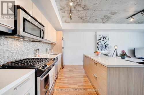 701 - 25 Oxley Street, Toronto, ON - Indoor Photo Showing Kitchen With Upgraded Kitchen