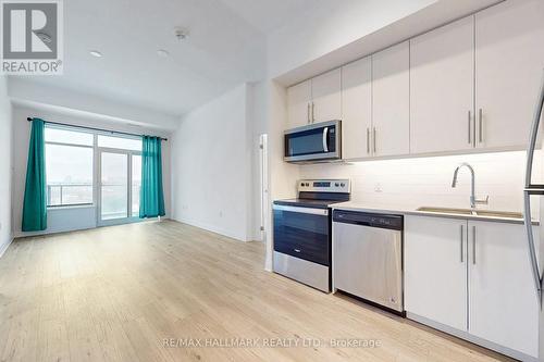 421 - 3220 Sheppard Avenue E, Toronto, ON - Indoor Photo Showing Kitchen With Stainless Steel Kitchen