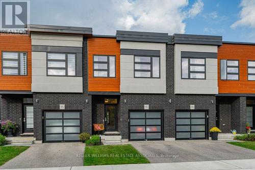 97 - 60 Arkell Road, Guelph, ON - Outdoor With Facade