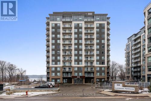 705 - 56 Lakeside Terrace, Barrie, ON - Outdoor With Balcony With Facade