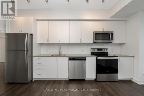 705 - 56 Lakeside Terrace, Barrie, ON - Indoor Photo Showing Kitchen