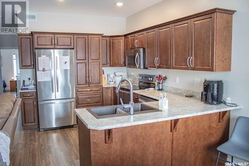 112N 1St Avenue N, St. Brieux, SK - Indoor Photo Showing Kitchen With Double Sink