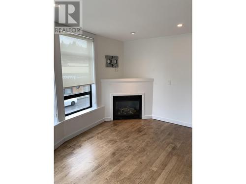 203 935 W 16Th Street, North Vancouver, BC - Indoor Photo Showing Living Room With Fireplace