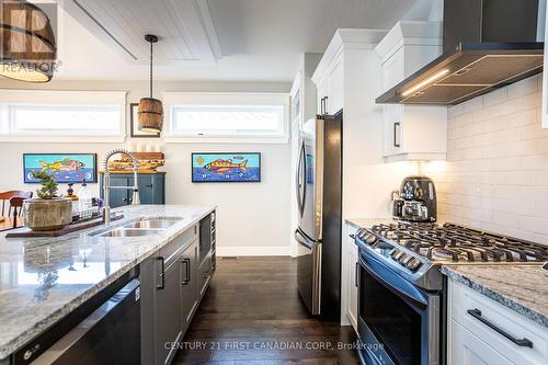 7 Sunrise Lane, Lambton Shores (Grand Bend), ON - Indoor Photo Showing Kitchen With Double Sink With Upgraded Kitchen