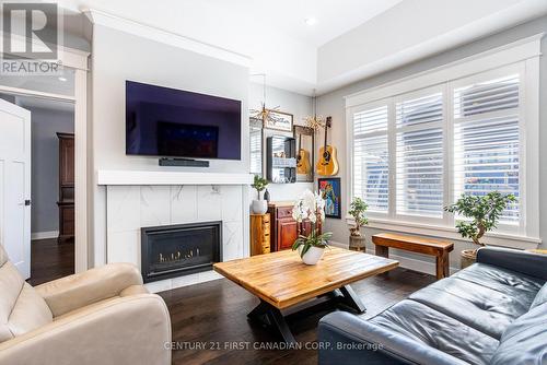 7 Sunrise Lane, Lambton Shores (Grand Bend), ON - Indoor Photo Showing Living Room With Fireplace