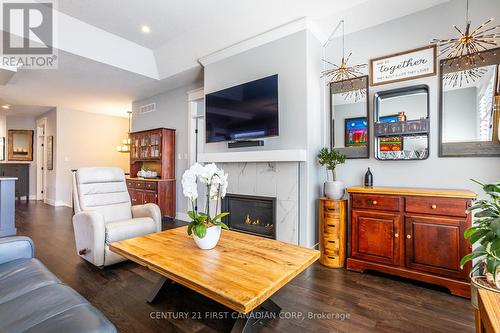 7 Sunrise Lane, Lambton Shores (Grand Bend), ON - Indoor Photo Showing Living Room With Fireplace