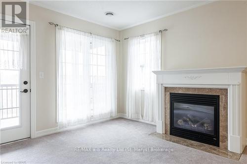 7 - 20 Huron Street N, St. Marys, ON - Indoor Photo Showing Living Room With Fireplace