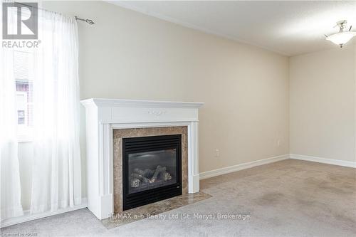 7 - 20 Huron Street N, St. Marys, ON - Indoor Photo Showing Living Room With Fireplace