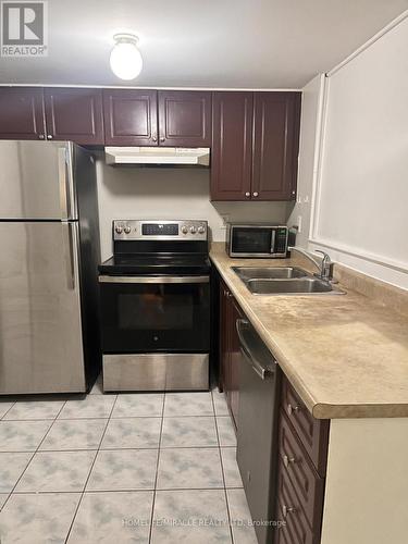 12 - 200 Mclevin Avenue, Toronto, ON - Indoor Photo Showing Kitchen With Double Sink