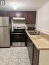 12 - 200 Mclevin Avenue, Toronto, ON  - Indoor Photo Showing Kitchen With Double Sink 