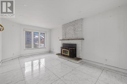 135 Natanya Boulevard, Georgina, ON - Indoor Photo Showing Living Room With Fireplace