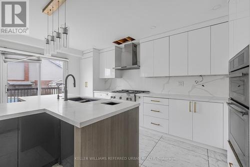 135 Natanya Boulevard, Georgina, ON - Indoor Photo Showing Kitchen With Double Sink With Upgraded Kitchen