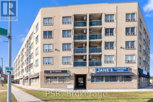 303 - 160 Wellington Street E, Aurora, ON - Outdoor With Balcony With Facade