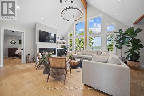 1213 Norcan Lake Lane, North Frontenac (Frontenac North), ON - Indoor Photo Showing Living Room With Fireplace