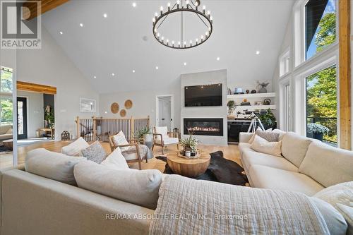 1213 Norcan Lake Lane, North Frontenac (Frontenac North), ON - Indoor Photo Showing Living Room With Fireplace