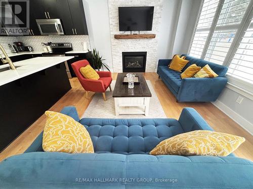 737 White Alder Avenue, Ottawa, ON - Indoor Photo Showing Living Room With Fireplace