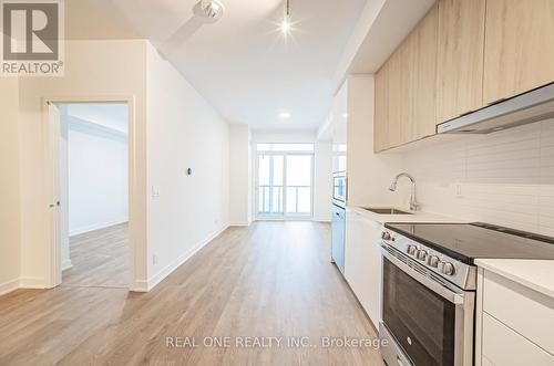 A2606 - 30 Upper Mall Way, Vaughan, ON - Indoor Photo Showing Kitchen With Upgraded Kitchen