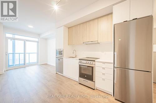 A2606 - 30 Upper Mall Way, Vaughan, ON - Indoor Photo Showing Kitchen