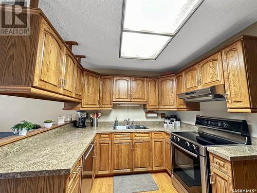 234 Burke Crescent, Swift Current, SK - Indoor Photo Showing Kitchen With Double Sink