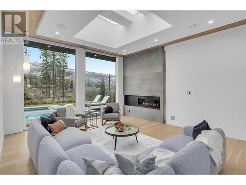 1297 Jack Smith Road, Kelowna, BC - Indoor Photo Showing Living Room With Fireplace