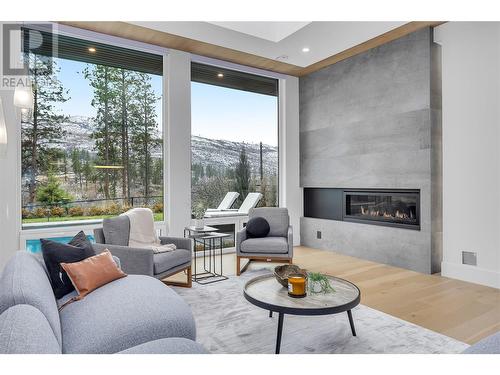 1297 Jack Smith Road, Kelowna, BC - Indoor Photo Showing Living Room With Fireplace