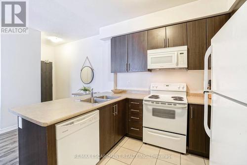 211 - 263 Georgian Drive, Oakville, ON - Indoor Photo Showing Kitchen With Double Sink