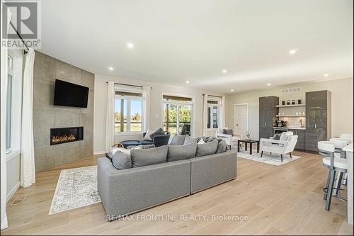 462 Althorpe Road E, Tay Valley, ON - Indoor Photo Showing Living Room With Fireplace