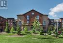 4 - 35 Madelaine Drive, Barrie, ON  - Outdoor With Balcony With Facade 