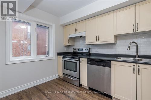 4 - 35 Madelaine Drive, Barrie, ON - Indoor Photo Showing Kitchen With Double Sink