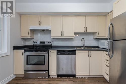 4 - 35 Madelaine Drive, Barrie, ON - Indoor Photo Showing Kitchen With Double Sink