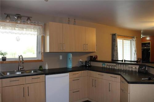 18013 124 N Road, Arnes, MB - Indoor Photo Showing Kitchen With Double Sink