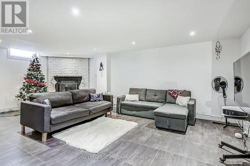 Lower - 8 David Gohn Circle, Markham, ON - Indoor Photo Showing Living Room With Fireplace