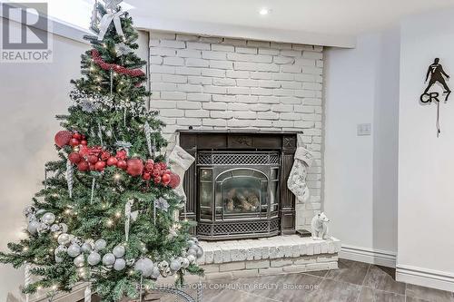 Lower - 8 David Gohn Circle, Markham, ON - Indoor Photo Showing Living Room With Fireplace