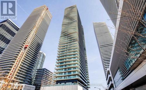 702 - 33 Shore Breeze Drive, Toronto, ON - Outdoor With Balcony With Facade