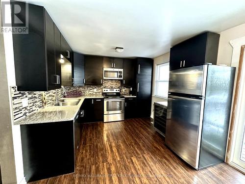 10 Heber Down Crescent, Whitby, ON - Indoor Photo Showing Kitchen With Double Sink With Upgraded Kitchen