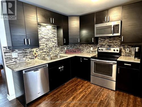 10 Heber Down Crescent, Whitby, ON - Indoor Photo Showing Kitchen With Double Sink With Upgraded Kitchen