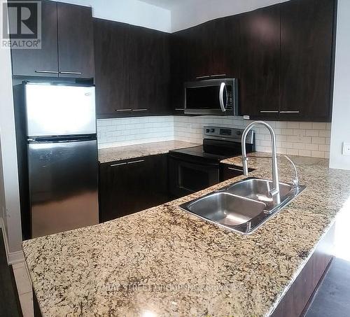 602 - 88 Broadway Avenue N, Toronto, ON - Indoor Photo Showing Kitchen With Double Sink