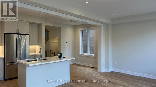 6 - 2184 Postmaster Drive, Oakville, ON - Indoor Photo Showing Kitchen With Double Sink