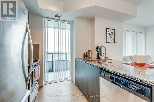 2304 - 20 Shore Breeze Drive, Toronto, ON - Indoor Photo Showing Kitchen With Stainless Steel Kitchen