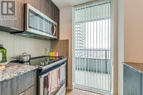 2304 - 20 Shore Breeze Drive, Toronto, ON - Indoor Photo Showing Kitchen